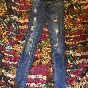 Distressed dark wash jeans